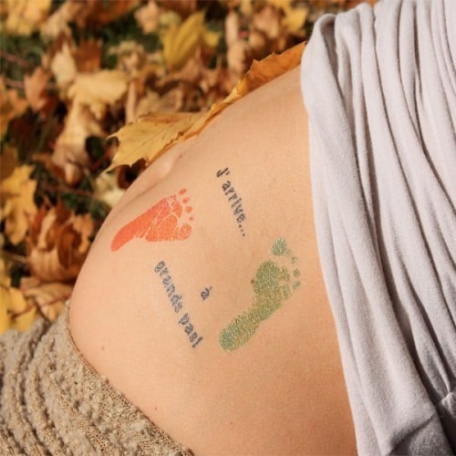 Tatouage bedondi "J'arrive à grand pas!" Tatouage bedondi "J'arrive à grand pas!"